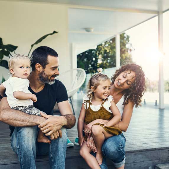Couple & Children on Patio